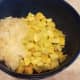 When the squash and onions are done cooking, add them to a large mixing bowl.