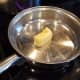 In a separate pan, melt your butter over medium high heat.