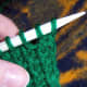 Transfer stitches back to the first needle.