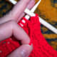 Purl the next stitch.
