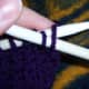 Insert left needle under the first stitch on the working needle.