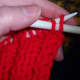 Draw the first stitch over the second.