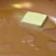 Melt the butter and heat together with the extra virgin olive oil