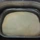 After the cycle is complete and the dough has risen.