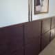 Instead of traditional wainscoting, wood paneling can be used to create an attractive and more masculine look.
