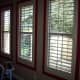Even large windows with shutters or blinds can be surrounded by a colored paint border.