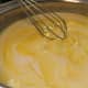 Adding the egg yolks