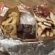 Putting foil and plastic wrap underneath the cookies helps prevent them from breaking. Adjust the amount of foil and plastic wrap depending on the number of cookies you make.