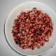 Chop 12 ounces of fresh cranberries, and place in a bowl.