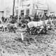 Muddy street in Dawson, 1898