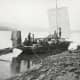 Klondikers sailing toward Dawson on the upper Yukon River, 1898.