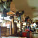 See the saddles above the booths?