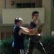 Defender strikes down with his elbow on the attacker's arms and is released from the choke
