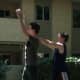 Defender raises both hands up