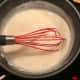 Combine sugar, flour, tapioca, salt and milk in a saucepan. 