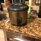 We use a rice cooker to prepare our rice.  It's been a feature on our kitchen counter for many an evening over the years.