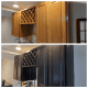 These two photos show the transformation of oak cabinets from unpainted to black.