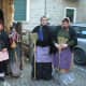Italian ladies dressed like la Befana on January 6.