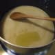 Stir vegetable oil into the sugar-milk mixture.
