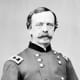 Major General Daniel E. Sickles who moved his troops forward without checking with his commanders in front of Little Round Top giving Confederate troops the advantage of attacking both his flanks.