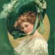 Vintage St. Patrick's Day greeting card: Victorian woman dressed in white gown and green hat