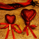 Cut the sticks off the decorative hearts.