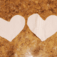 Cut out two heart shapes.