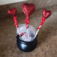 Arrange your hearts in your cauldron or container.