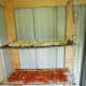 Carrots and garlic drying on silicon mats on old oven racks.