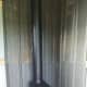 Wood stove in the dehydrator room.
