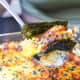 Step 5: Bake and Enjoy. When cooked, scoop a portion and wrap it with a nori sheet (seaweed wrapper).