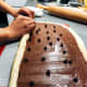 Starting at the long edge, tightly roll up each dough rectangle jelly-roll style into a tight log.