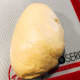 Transfer the mixture onto a baking mat to shape the dough into a ball.