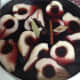 Pour the red wine mixture over the pears. It already looks so pretty!