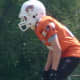 My youngest son as running back for his rep team waiting for the ball.