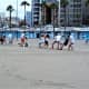 Tug-of-war on Playa de las Alcaravaneras.