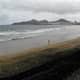 Dark sand at the southern end of Playa de las Canteras.