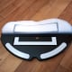 The center portion of the mop bracket vibrates to induce a scrubbing action