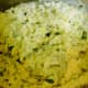 Mixing up the ricotta, beaten eggs, 1/2 of the Parmesan, and the chopped herbs