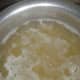 Boil some water with salt and oil. Then add pasta.