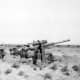 88mm Flak 18 guns fire upon British armor they would prove one of the most effective tank killers of the Second World War
