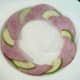 Apple slices and ham are plated