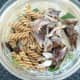 Cooled pasta and flaked mackerel fillet are added to salad