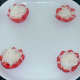 Tomato halves are filled with grated turnip and plated
