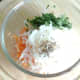 Preparing turnip and carrot salad