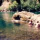 My niece decides to enjoy the cold waters of the Umpqua River.