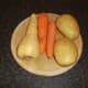 Potatoes, carrots and parsnip for mash