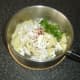 Additional fish cake ingredients are added to the mashed potato