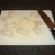 Cod loin fillet is cut in to goujons