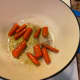 The skin on the carrots has a bubbly texture to it. This is when I remove my carrots just before they start to burn. 